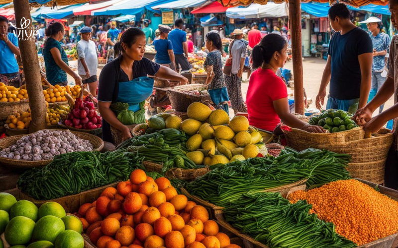Local vendors selling fresh produce, spices, and souvenirs at Kampot Market—a bustling hub of culture and flavors.