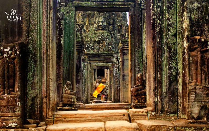 A quiet moment at Bayon Temple, featuring the serene stone faces of Avalokiteshvara